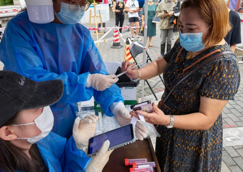 核酸檢測現場。崇州市委組織部供圖