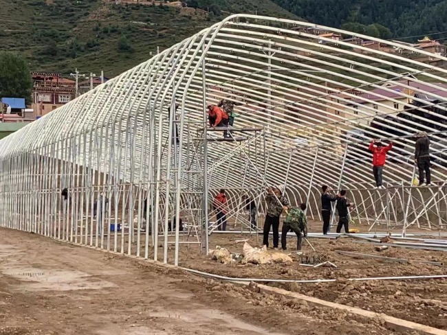 建設中的大蓋示范園。新龍縣委宣傳部供圖